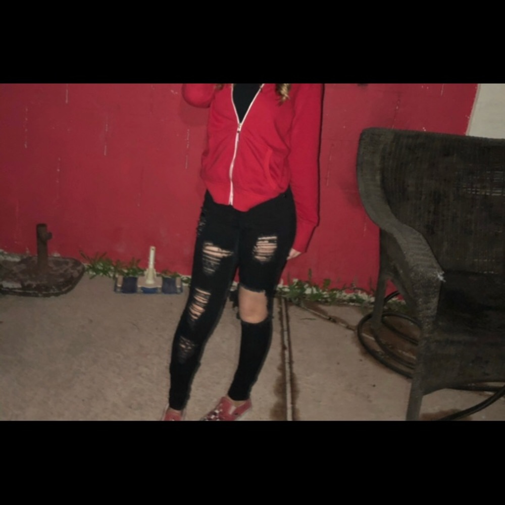 Black ripped jeans.